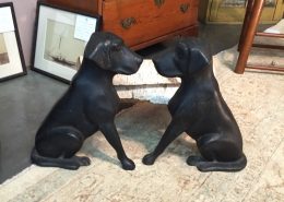 c. 1930s American cast iron andirons in shape of facing pair of black Labrador dogs